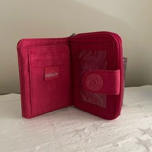 Brand new w/ out tags Kipling women’s wallet !